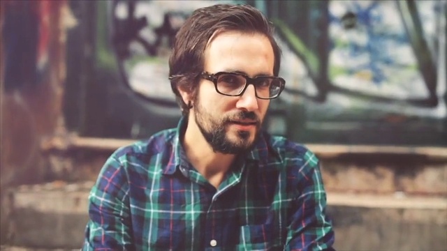 Video Reference: Glasses, Vision care, Tartan, Beard, Dress shirt, Sleeve, Street fashion, Eyewear, Collar, Facial hair