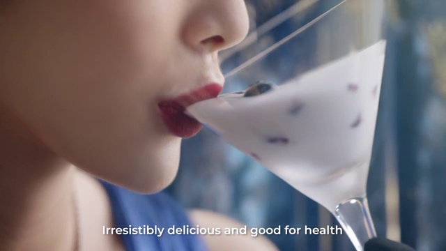 Video Reference: Lip, Drinkware, Liquid, Tableware, Eyelash, Jaw, Neck, Fluid, Gesture, Martini glass