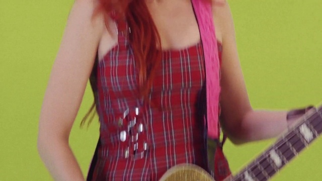 Video Reference: Musical instrument, Arm, Guitar, Tartan, Guitar accessory, Human body, Neck, Sleeve, String instrument accessory, Waist