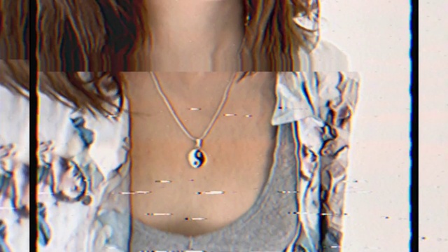 Video Reference: Hair, Chin, Hairstyle, Shoulder, Eyelash, Body jewelry, Azure, Neck, Human body, Jaw