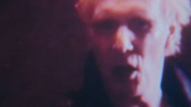 Video Reference: Nose, Cheek, Jaw, Flash photography, Eyelash, Facial hair, Electric blue, Entertainment, Darkness, Event