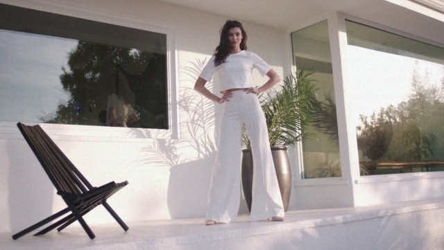 Video Reference: Shoulder, Plant, Comfort, Sleeve, Window, Waist, Interior design, Fashion design, Wood, Flooring