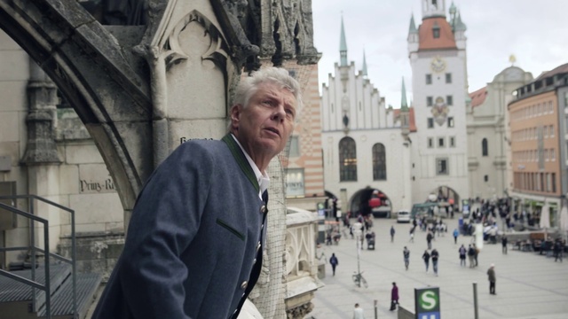 Video Reference: Building, Temple, Sky, Travel, Public space, City, Facade, Human settlement, Street, Pedestrian