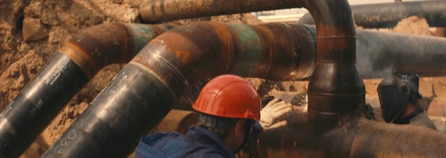 Video Reference: Hard hat, Helmet, Automotive tire, Wood, Pipeline transport, Steel casing pipe, Gas, Plumbing, Cylinder, Engineering