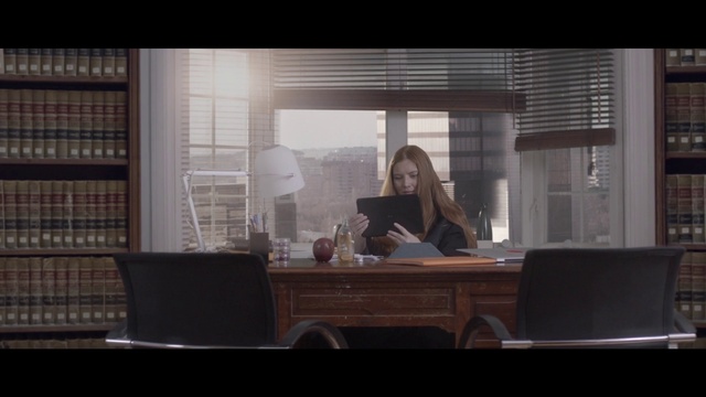 Video Reference: Furniture, Table, Window, Building, Interior design, Desk, Comfort, Window blind, Shelf, Tints and shades