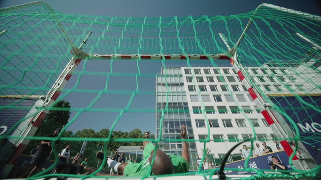 Video Reference: Building, Green, Tower, Electricity, Urban design, Net, Leisure, Stadium, Sky, City