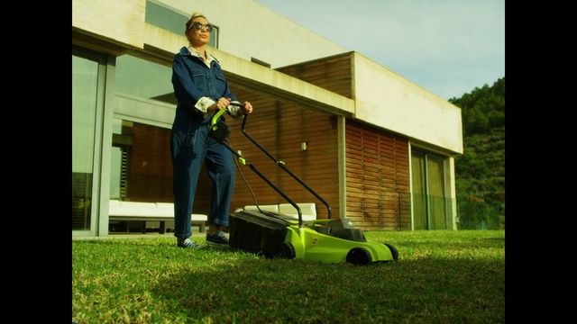 Video Reference: Lawn mower, Wheel, Tire, Walk-behind mower, Mower, Sky, Plant, People in nature, Window, Grass