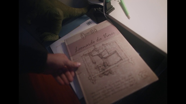 Video Reference: Automotive design, Gesture, Font, Wood, Office supplies, Writing, Art, Paper, Office instrument, Event