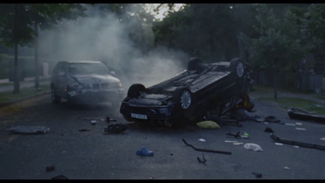 Video Reference: Car, Vehicle, Motor vehicle, Automotive lighting, Hood, Tire, Tree, Automotive tire, Asphalt, Automotive exterior