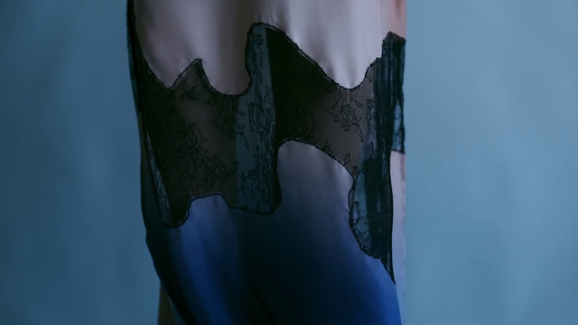 Video Reference: Hand, Dress, Gesture, Flag, Art, Waist, Electric blue, Human leg, Bat, Knee