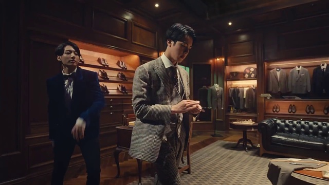 Video Reference: Suit trousers, Flash photography, Suit, Blazer, Chair, Formal wear, Event, Fashion design, Tie, Home appliance