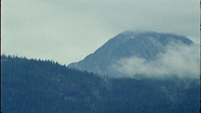 Video Reference: Sky, Cloud, Mountain, Tree, Slope, Cumulus, Natural landscape, Landscape, Geological phenomenon, Fog