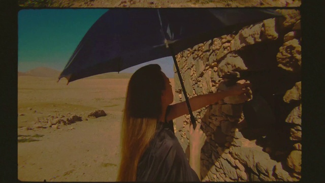 Video Reference: Umbrella, Gesture, People in nature, Art, Shade, Adaptation, Tints and shades, Travel, Landscape, Visual arts