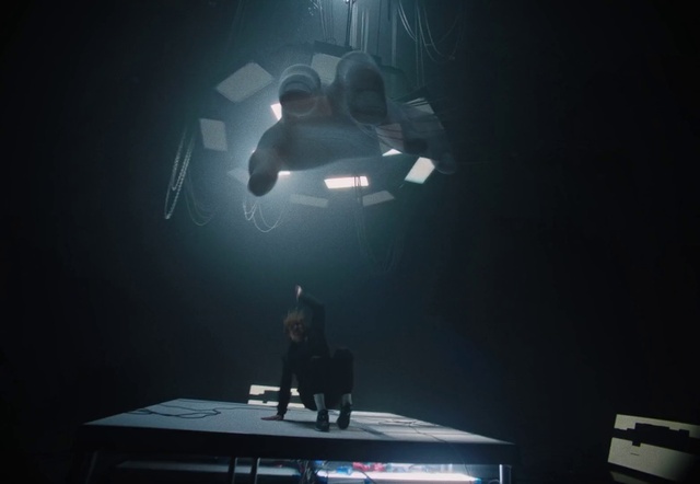 Video Reference: Black, Table, Lighting, Entertainment, Performing arts, Visual effect lighting, Darkness, Lens flare, Event, Desk