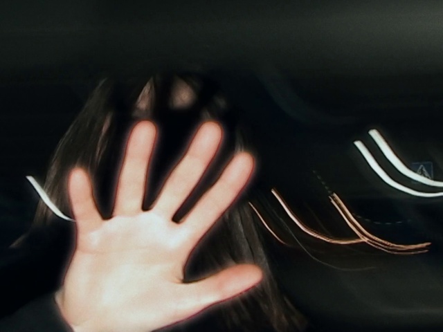 Video Reference: Flash photography, Gesture, Finger, Eyelash, Nail, Thumb, Tints and shades, Wrist, Electric blue, Darkness