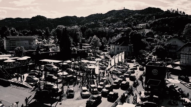 Video Reference: Sky, Cloud, Black, Black-and-white, Building, Tree, Style, City, Urban design, Landscape