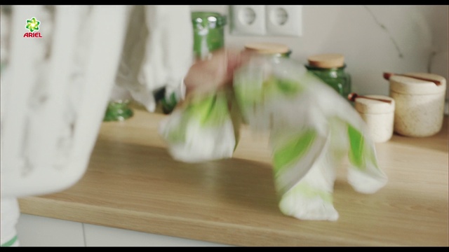 Video Reference: Gesture, Floor, Wood, Flooring, Hardwood, Human leg, Foot, Laminate flooring, Countertop, Companion dog