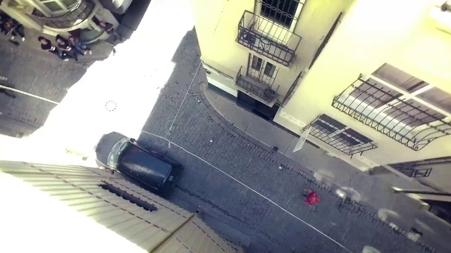 Video Reference: Window, Building, Product, Automotive tire, Mode of transport, Urban design, Asphalt, Floor, Line, Material property