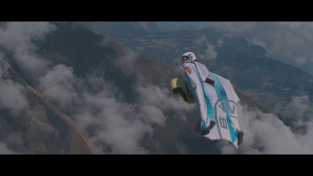 Video Reference: Cloud, Sky, Aircraft, Mountain, Air travel, Helmet, Wing, Travel, Windsports, Parachuting