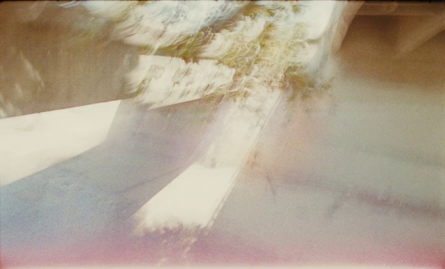 Video Reference: Dress, Window, Wood, Tints and shades, Linens, Flooring, Bridal accessory, Tree, Feather, Shadow