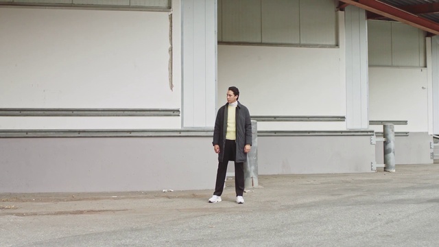 Video Reference: Sleeve, Asphalt, Grey, Road surface, Street fashion, Blazer, Formal wear, Flooring, Concrete, Road