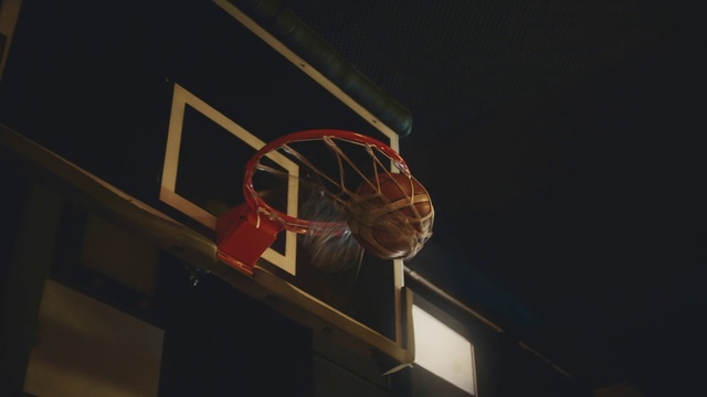 Video Reference: Basketball hoop, Sky, Hat, Building, Space, Darkness, Wood, Automotive wheel system, Night, Circle