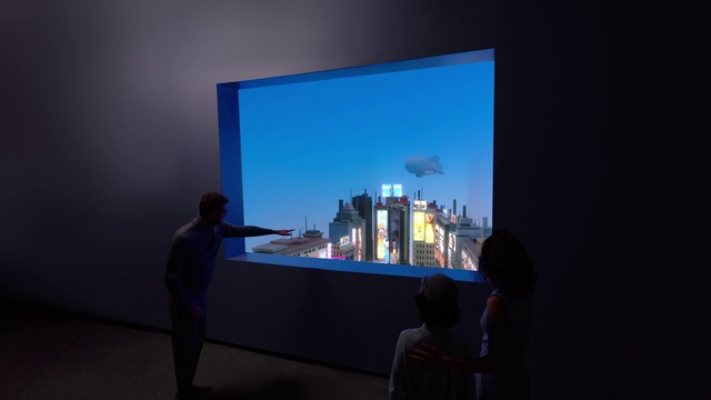Video Reference: Sky, T-shirt, Flat panel display, Projection screen, Art, Event, Display device, Technology, Gadget, Electric blue
