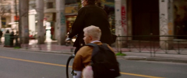 Video Reference: Hair, Hairstyle, Wheel, Shorts, Mode of transport, Interaction, Asphalt, Road, Luggage and bags, Motorcycle