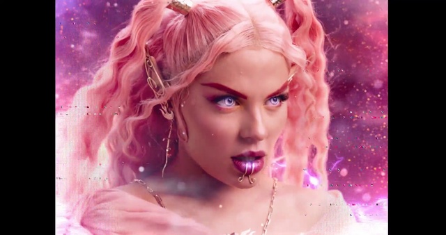 Video Reference: Skin, Lip, Eyebrow, Eyelash, Purple, Mouth, Flash photography, Pink, Lipstick, Violet