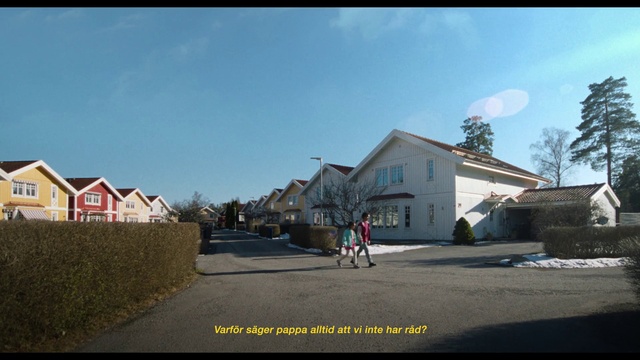 Video Reference: Sky, Building, Cloud, Window, House, Tree, Land lot, Plant, Asphalt, Road surface