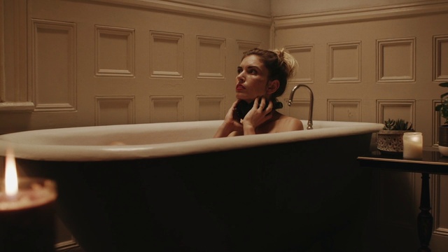 Video Reference: Bathtub, Plumbing fixture, Tap, Jacuzzi, Flowerpot, Bathroom, Plant, Houseplant, Flooring, Bathing