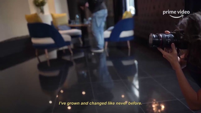 Video Reference: Furniture, Photographer, Camera lens, Reflex camera, Camera, Digital camera, Cameras & optics, Digital SLR, Chair, Table