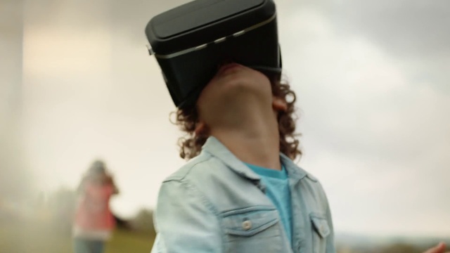 Video Reference: Outerwear, Peaked cap, Hat, Cap, Sleeve, Gesture, Travel, Happy, Street fashion, T-shirt