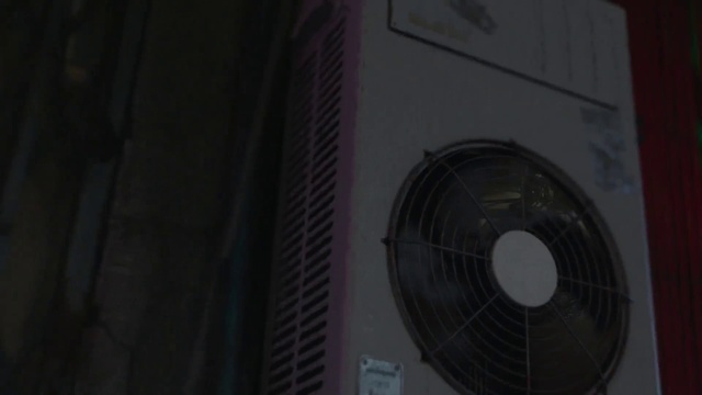 Video Reference: Building, Electric fan, Tints and shades, Gas, Font, Circle, Composite material, Tower, City, Mechanical fan