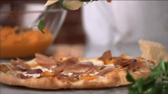 Video Reference: Food, Ingredient, Pizza, Recipe, Plant, Cuisine, Tableware, Dish, Wood, Meat
