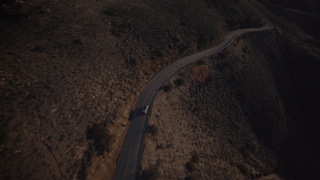 Video Reference: Road surface, Plant, Asphalt, Wood, Slope, Landscape, Road, Soil, Automotive tire, Dirt road