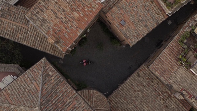 Video Reference: Brown, Building, Window, Wood, House, Road surface, Brickwork, Brick, Flooring, Building material