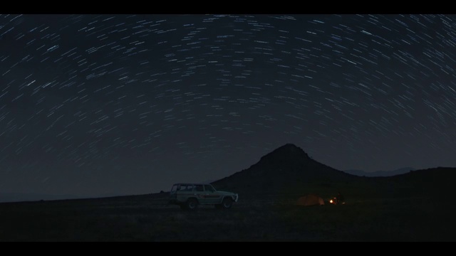 Video Reference: Sky, Landscape, Horizon, Tints and shades, Midnight, Astronomical object, Mountain, Star, Science, Wheel