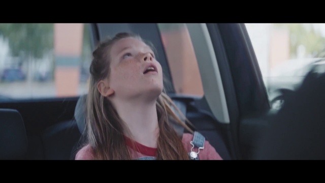 Video Reference: Lip, Flash photography, Gesture, Car, Personal luxury car, Vehicle door, Long hair, Electric blue, Automotive design, Eyewear