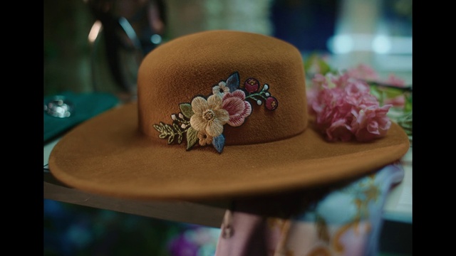 Video Reference: Hat, Sun hat, Fedora, Cap, Costume hat, Flower, Creative arts, Hair accessory, Magenta, Fashion accessory