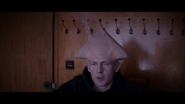 Video Reference: Jaw, Flash photography, Headgear, Wall, Cap, Wood, Font, Hat, Art, Darkness