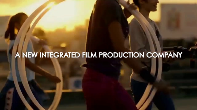 Video Reference: Sleeve, Gesture, Eyewear, Street fashion, Blazer, Font, Audio equipment, Formal wear, Suit, Personal protective equipment