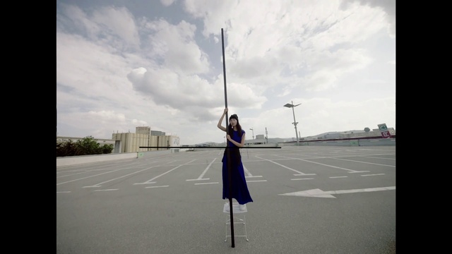 Video Reference: Cloud, Sky, Road surface, Asphalt, Gesture, Flash photography, Road, Pole, Plant, Electric blue