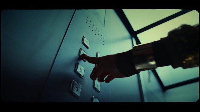 Video Reference: Watch, Gesture, Font, Sky, Wrist, Window, Electric blue, Display device, Flash photography, Vehicle door