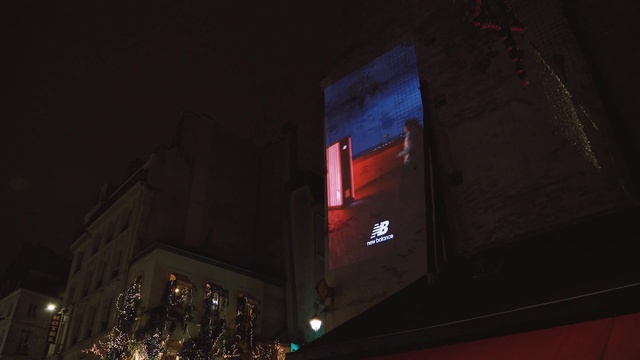 Video Reference: Electricity, Automotive lighting, Building, Facade, Tower block, City, Metropolis, Font, Midnight, Electronic signage