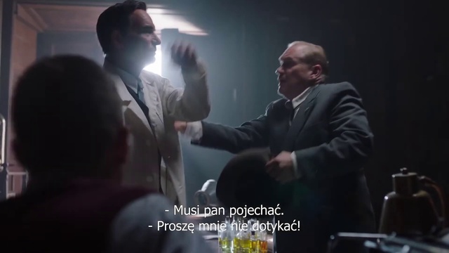 Video Reference: Flash photography, Coat, Gesture, Suit, Font, Formal wear, Event, Entertainment, Darkness, Conversation