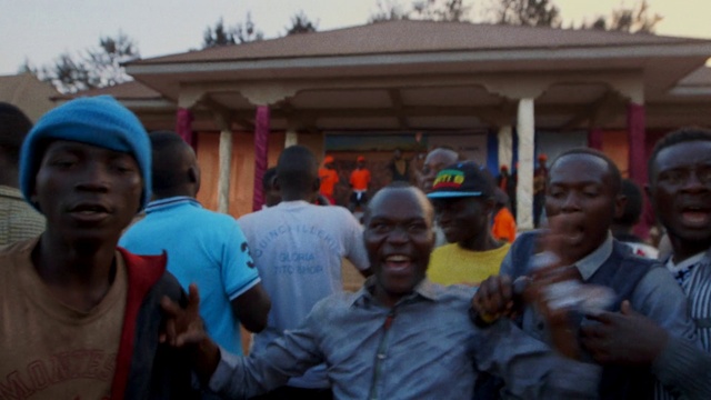 Video Reference: Forehead, Head, Shirt, Sky, Smile, Temple, Tree, Headgear, Hat, T-shirt