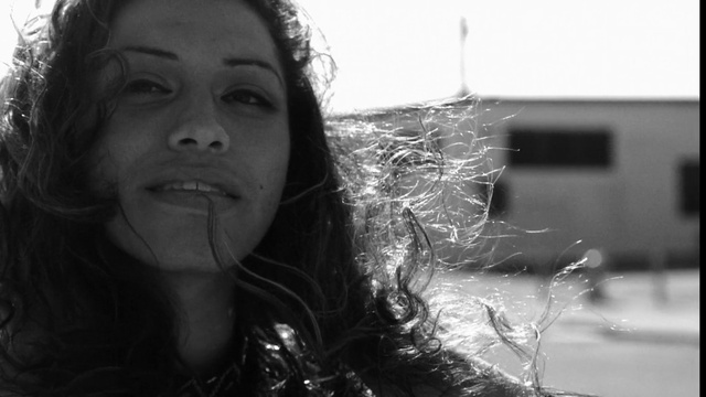 Video Reference: Nose, Skin, Lip, Hairstyle, Eyebrow, Facial expression, Mouth, Flash photography, Happy, Black-and-white