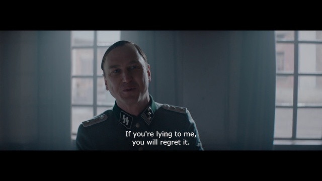 Video Reference: Jaw, Flash photography, Sleeve, Collar, Font, Screenshot, Window, Electric blue, Formal wear, Darkness