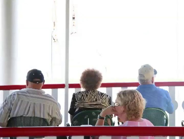Video Reference: T-shirt, Hat, Event, Mast, Tower, Passenger, Leisure, Conversation, Sitting, Glass